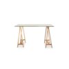 Waverley Trestle Desk, is a boss glass tabletop and metal legs finished in an oak-coloured foil.